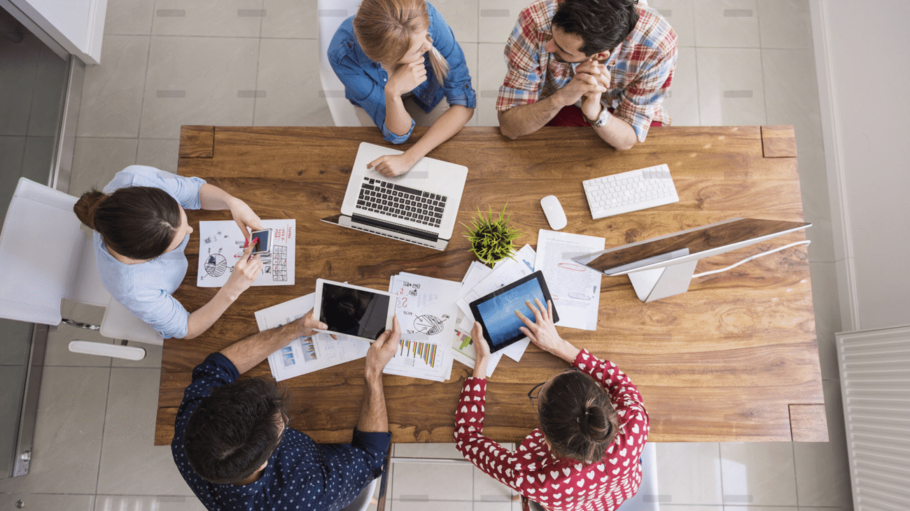 demo-attachment-2714-top-view-coworkers-team-working-office1